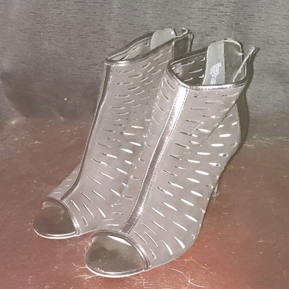 Black ankle high zip up heels